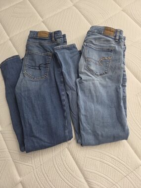 2 American Eagle Outfitters  Skinny Jeans For $13- Dark Blue & Light Blue
